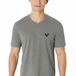 A male model wearing a premium lightweight cotton jersey v-neck t-shirt with a minimalist black logo on the left chest, featuring a modern fit and clean design.