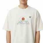 oversized t-shirt featuring a geometric mountain peak and sun graphic on the chest with a small black VALE logo.