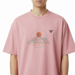 oversized t-shirt featuring a geometric mountain peak and sun graphic on the chest with a small black VALE logo.