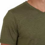 A high-performance men's dry-fit moisture-wicking athletic t-shirt featuring a v-neckline, chest logo, and a modern curved bottom hem.
