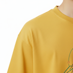 oversized t-shirt featuring a geometric mountain peak and sun graphic on the chest with a small black VALE logo.