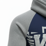 Back and front view of VALE brand breathable cotton tracksuit featuring a large shield logo, raglan sleeves, and matching joggers on a white background.