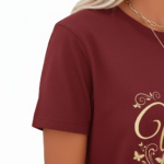 Women wearing Vale branded cotton graphic t-shirt with butterfly and floral swirl design, available in Maroon, Grey, and Cream colors.