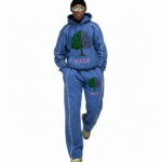 Men's 2-piece streetwear tracksuit set made of breathable cotton featuring white contrast piping, a split-tree graphic logo, and wide-leg joggers in Grey, Blue, and Purple colors.