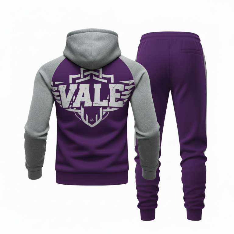 Back and front view of VALE brand breathable cotton tracksuit featuring a large shield logo, raglan sleeves, and matching joggers on a white background.