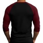 Close-up of a man wearing a breathable cotton raglan shirt featuring a vintage steampunk clockwork design and gothic 'Vale' text, athletic fit 3/4 sleeves.