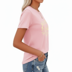 Woman wearing a breathable cotton t-shirt with a floral butterfly "VALE" graphic design on the chest, available in pink, red, and brown colors.