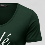 Front view of a premium breathable cotton t-shirt featuring the Valé script logo on the chest, displayed in a minimalist professional studio setting.
