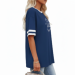 Women's oversized breathable cotton varsity t-shirt featuring a white VALE floral wreath graphic and striped sleeves, shown in Navy, Green, and Red.