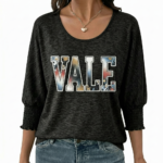 Women's breathable cotton scoop neck shirt featuring a floral 'VALE' graphic and smocked 3/4 sleeves, available in Charcoal, Navy, and Green.