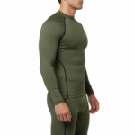 Front view of a man wearing a VALE brand 2-piece compression suit featuring a gold Tree of Life mandala graphic on the long-sleeve top and matching leggings, shown in brown, olive green, and grey colors.