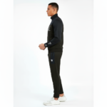 Side-by-side view of a male model wearing the VALE breathable cotton tracksuit in black, navy blue, and sand beige colors.