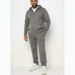 Men's designer breathable cotton tracksuit set featuring a full-zip hoodie and joggers with a silver branching line-art print and VALE cursive branding. Caption: Elevate your casual style with our artistic branch-print tracksuit—crafted from breathable cotton for ultimate all-day comfort.