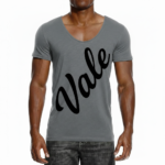 Man wearing a slim-fit Vale script V-neck t-shirt in dusty rose, charcoal grey, and sand beige colors.