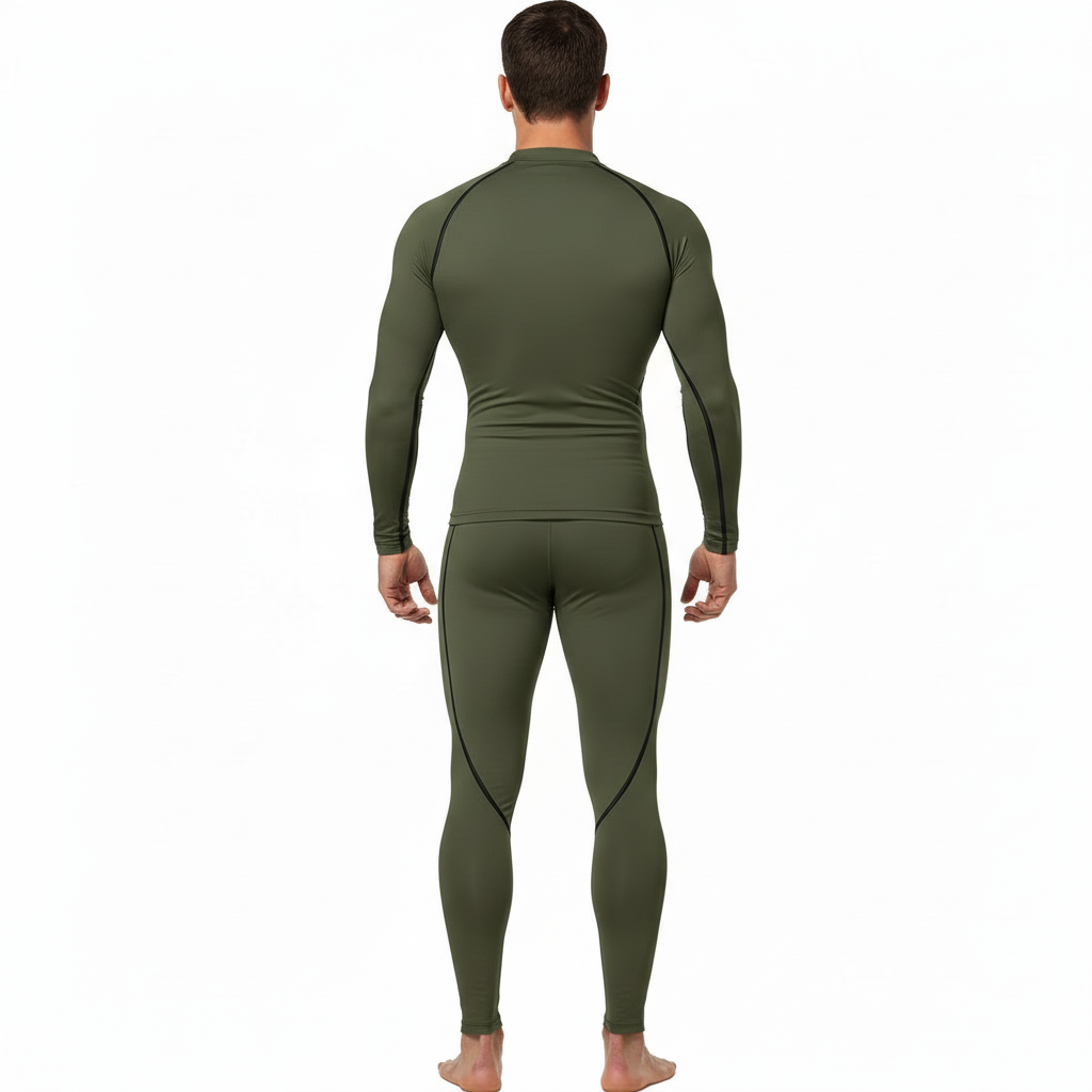 Front view of a man wearing a VALE brand 2-piece compression suit featuring a gold Tree of Life mandala graphic on the long-sleeve top and matching leggings, shown in brown, olive green, and grey colors.