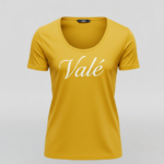 Front view of a premium breathable cotton t-shirt featuring the Valé script logo on the chest, displayed in a minimalist professional studio setting.