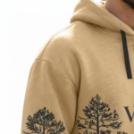 Men's designer wilderness-themed tracksuit set featuring a quarter-zip hoodie and cargo joggers with forest and deer landscape prints on breathable cotton.