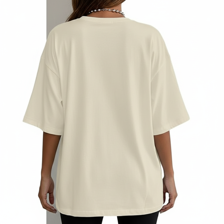 Woman wearing an oversized breathable cotton t-shirt with a red rose graphic and vertical text, available in black, slate blue, and sand beige colors.