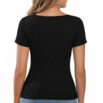 Close-up of a woman wearing a breathable ribbed cotton t-shirt featuring a glittery "Vale" graphic design with floral accents.