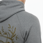 Rear and front view of a man wearing a VALE brand cotton tracksuit featuring a gold-foil vintage car and tree branch design on the back and vertical logo on the leg, shown on a white background.