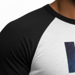 Men's athletic slim fit 3/4 sleeve raglan shirt featuring a vertical "VALE" textured graphic print on breathable cotton fabric.