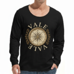 "Man wearing a VALE brand long sleeve cotton shirt featuring a vintage gold nautical compass graphic on the chest, available in black, forest green, and burgundy."