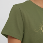 Women wearing Vale signature script t-shirt in breathable cotton, available in olive, blue, and purple colors.