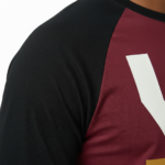 Men's 3/4 sleeve cotton raglan shirt with geometric compass graphic design in navy, maroon, and tan.
