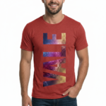 A man wearing a slim-fit 100% cotton t-shirt with a vertical 'VALE' graphic in a vibrant purple, gold, and blue metallic texture.