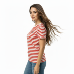 Woman wearing a breathable red and white striped cotton t-shirt with VALE embroidery and blue jeans, isolated on a white background. / Woman wearing an orange and white striped cotton crew neck t-shirt with VALE chest embroidery.