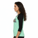 Women's VALE patchwork raglan shirt made of breathable cotton, 3/4 sleeves, featuring colorful textured letter patches on a baseball-style tee.