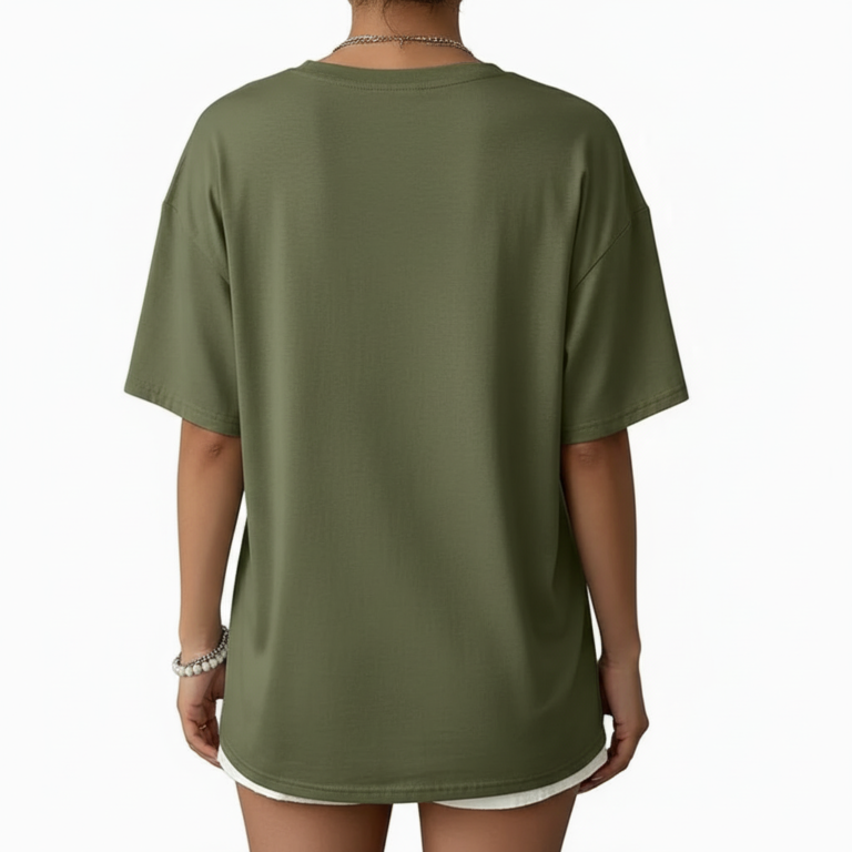 Front view of a woman wearing an oversized breathable cotton t-shirt with a vintage wildflower graphic print, available in blue, green, and orange.