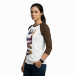 Person wearing a 3/4 sleeve raglan cotton shirt featuring a vertical VALE galaxy-textured graphic print.