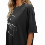 Oversized vintage washed cotton t-shirt featuring a skeleton lying in a coffin with "VALE BETTER" text, available in charcoal black, maroon burgundy, and slate gray.