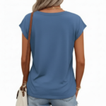 Woman wearing a breathable cotton V-neck t-shirt with "VALE" graphic print, available in Navy Blue, Slate Blue, and Olive Green.