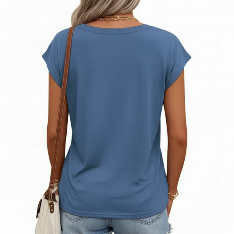 Woman wearing a breathable cotton V-neck t-shirt with "VALE" graphic print, available in Navy Blue, Slate Blue, and Olive Green.