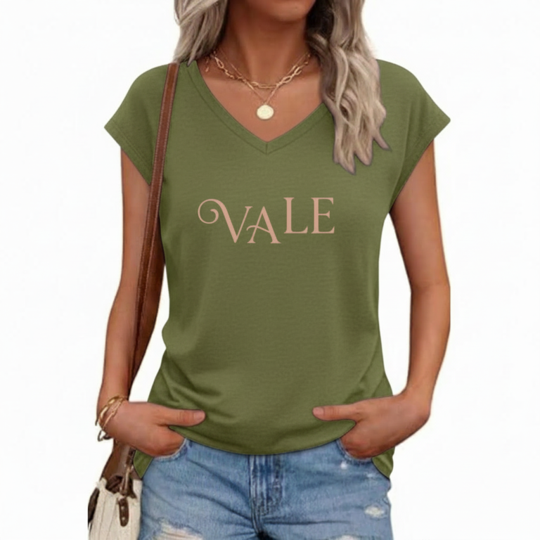 Woman wearing a breathable cotton V-neck t-shirt with "VALE" graphic print, available in Navy Blue, Slate Blue, and Olive Green.