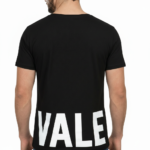 Close-up of a deep scoop neck shirt showing high-grade pique cotton texture.