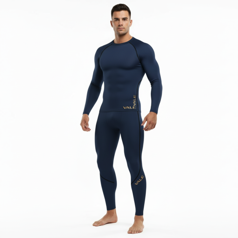 Front view of a man wearing a VALE brand long-sleeve compression shirt and matching leggings set in breathable fabric, available in white, navy blue, and maroon.