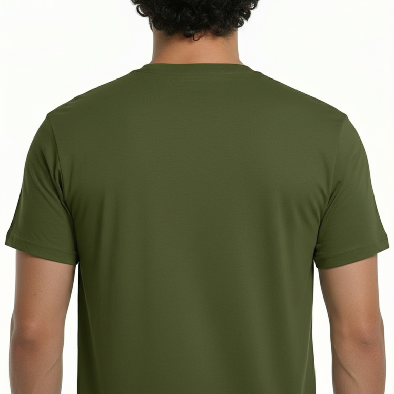 Man wearing a VALE nature graphic t-shirt featuring an eagle, pine tree, and mountain design in 100% breathable cotton.