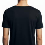 Close-up of a man wearing a burnt orange VALE distressed graphic t-shirt with white block lettering.