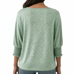 Women's breathable cotton VALE graphic top with floral lettering and smocked puff sleeves.