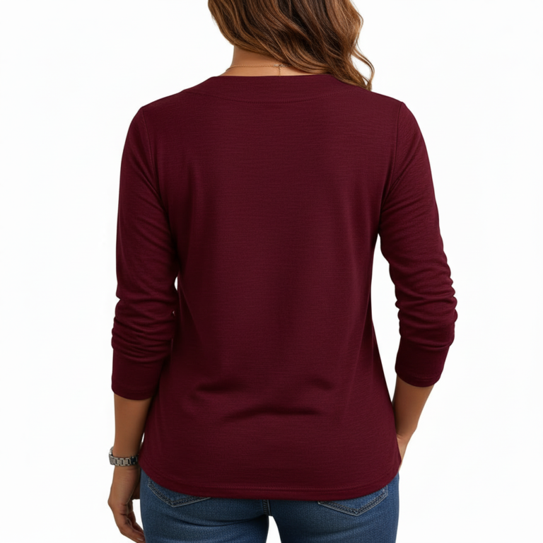 Women's long-sleeve V-neck cotton shirt featuring a gold VALE celestial sun, moon, and floral graphic design.