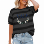 Women's breathable cotton striped t-shirt with puff sleeves and floral VALE graphic print, styled with light wash denim jeans.