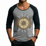 Men's 3/4 sleeve cotton raglan shirt featuring a vintage gold compass "VALE" graphic design on the chest.