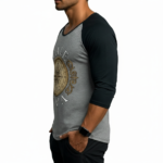 Men's 3/4 sleeve cotton raglan shirt featuring a vintage gold compass "VALE" graphic design on the chest.