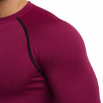 Front view of a man wearing a VALE brand long-sleeve compression shirt and matching leggings set in breathable fabric, available in white, navy blue, and maroon.