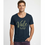Man wearing a breathable 100% cotton Vale signature scoop neck t-shirt in navy, pink, and burgundy colors, athletic slim fit.