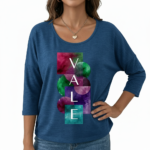 Front view of a woman wearing a breathable cotton 3/4 sleeve shirt with a "VALE" artistic watercolor geometric graphic design, available in maroon, black, and blue.