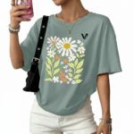 Women's oversized breathable cotton t-shirt featuring a vintage daisy floral print in sage green, brown, and red colors.